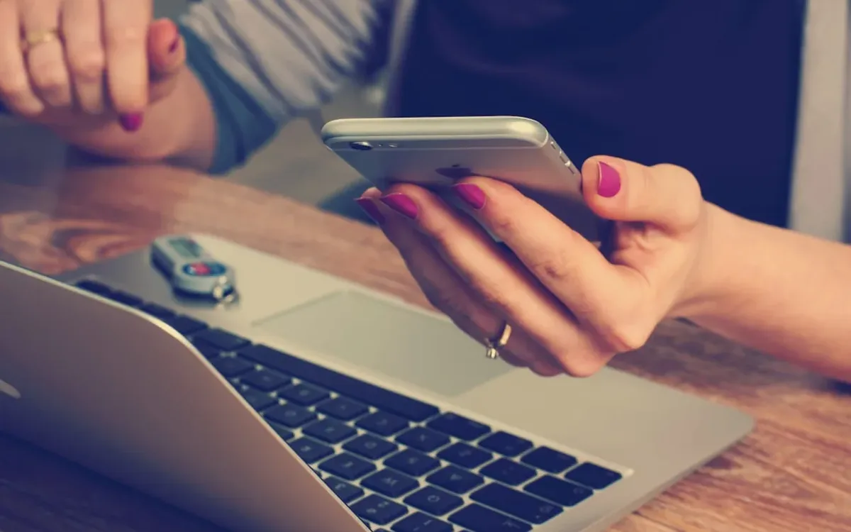 Hospitality business owner ready to take website enquiries by phone in the Winelands